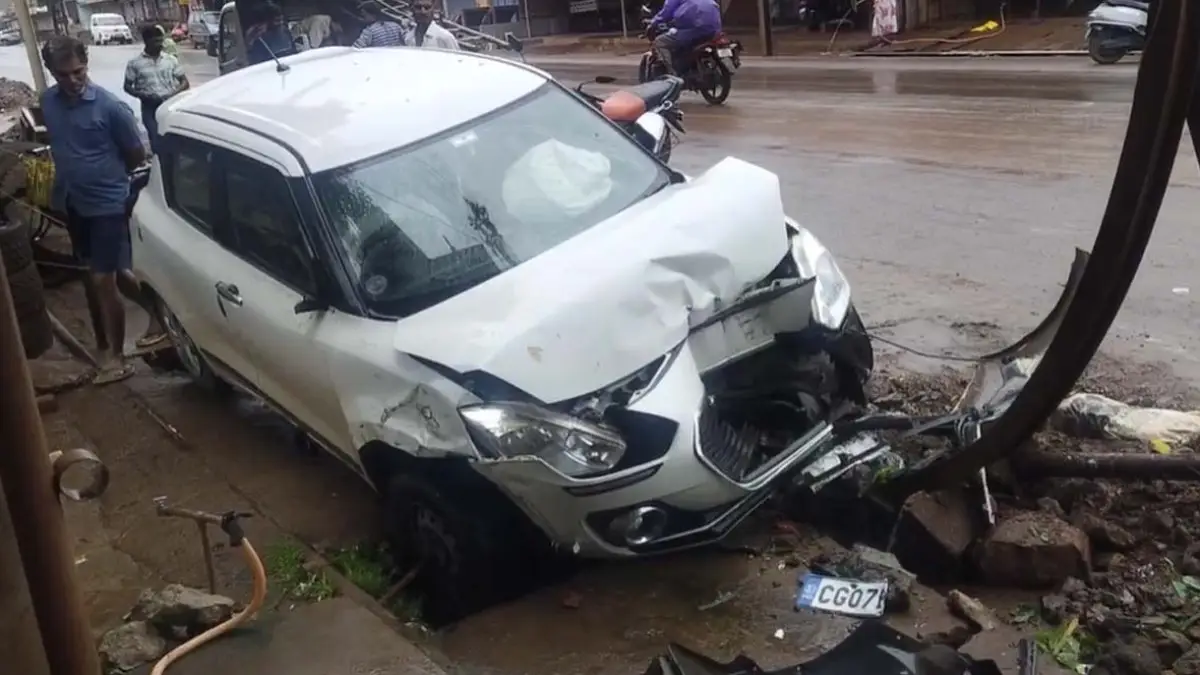 Damaged car after a road accident 1784788136